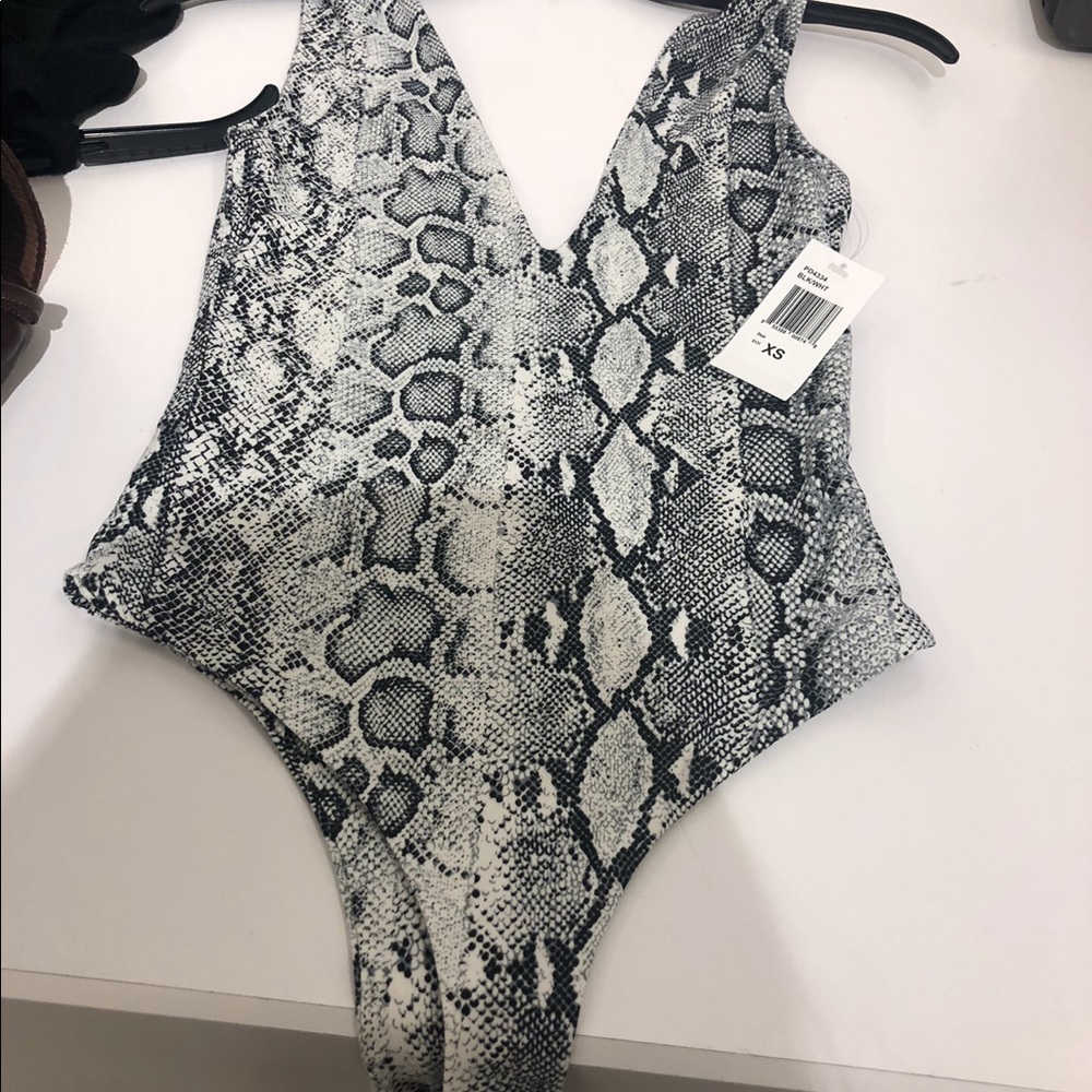 Black and white body suit